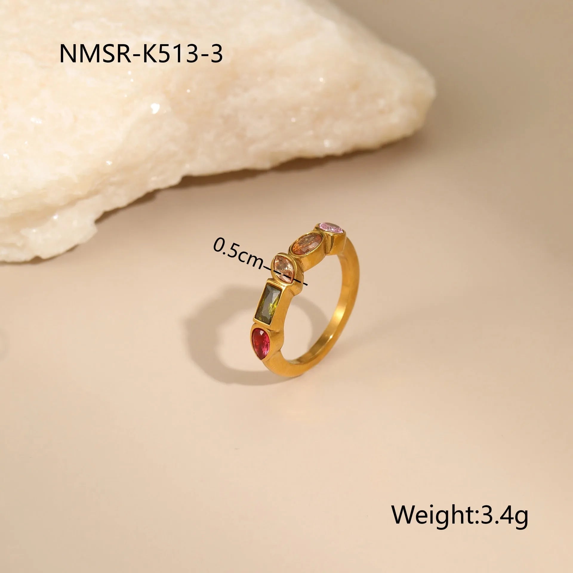 Geometric gold-plated jewellery set showing necklace, ring, and earrings on stainless steel with 18K plating