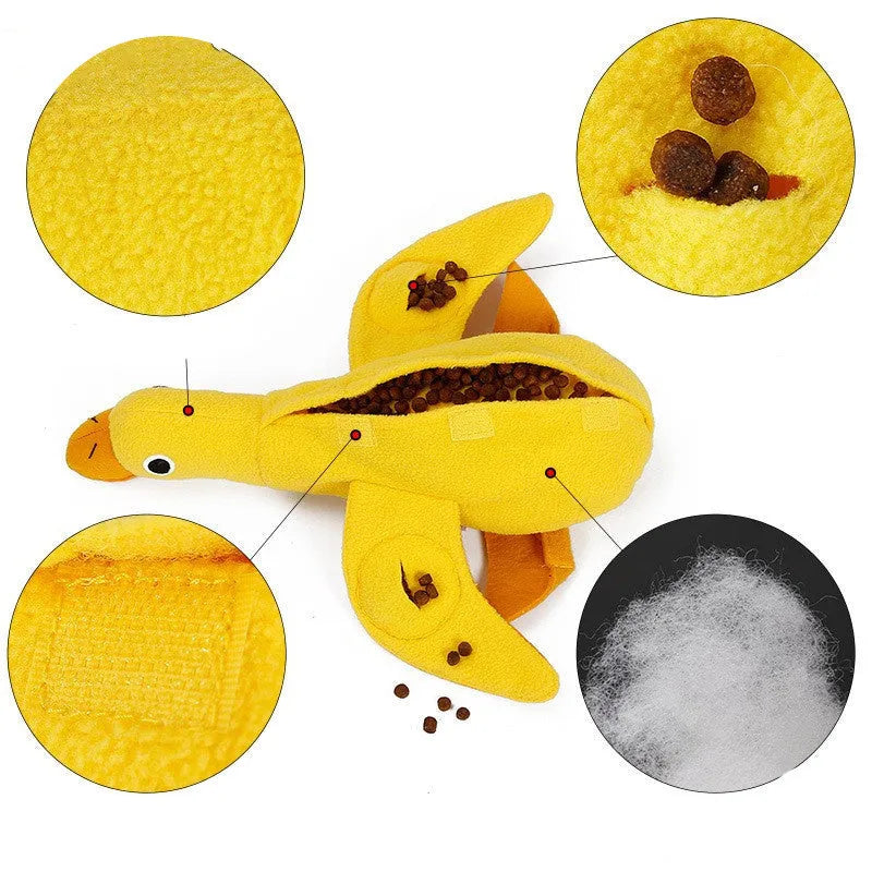 Yellow plush duck dog toy with treat holes and sound module for training and chewing