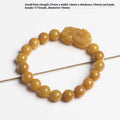 Carved Jinsi Jade money bracelet showing golden thread patterns in natural stone