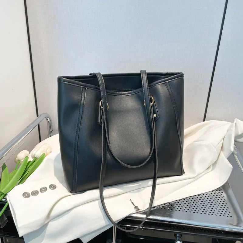 PU leather tote bag with contrast colour trim and internal mobile phone and document compartments