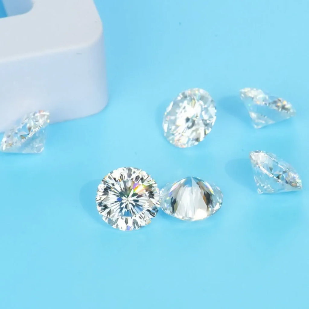 Round moissanite gemstone showing eight hearts and eight arrows cut pattern on dark background