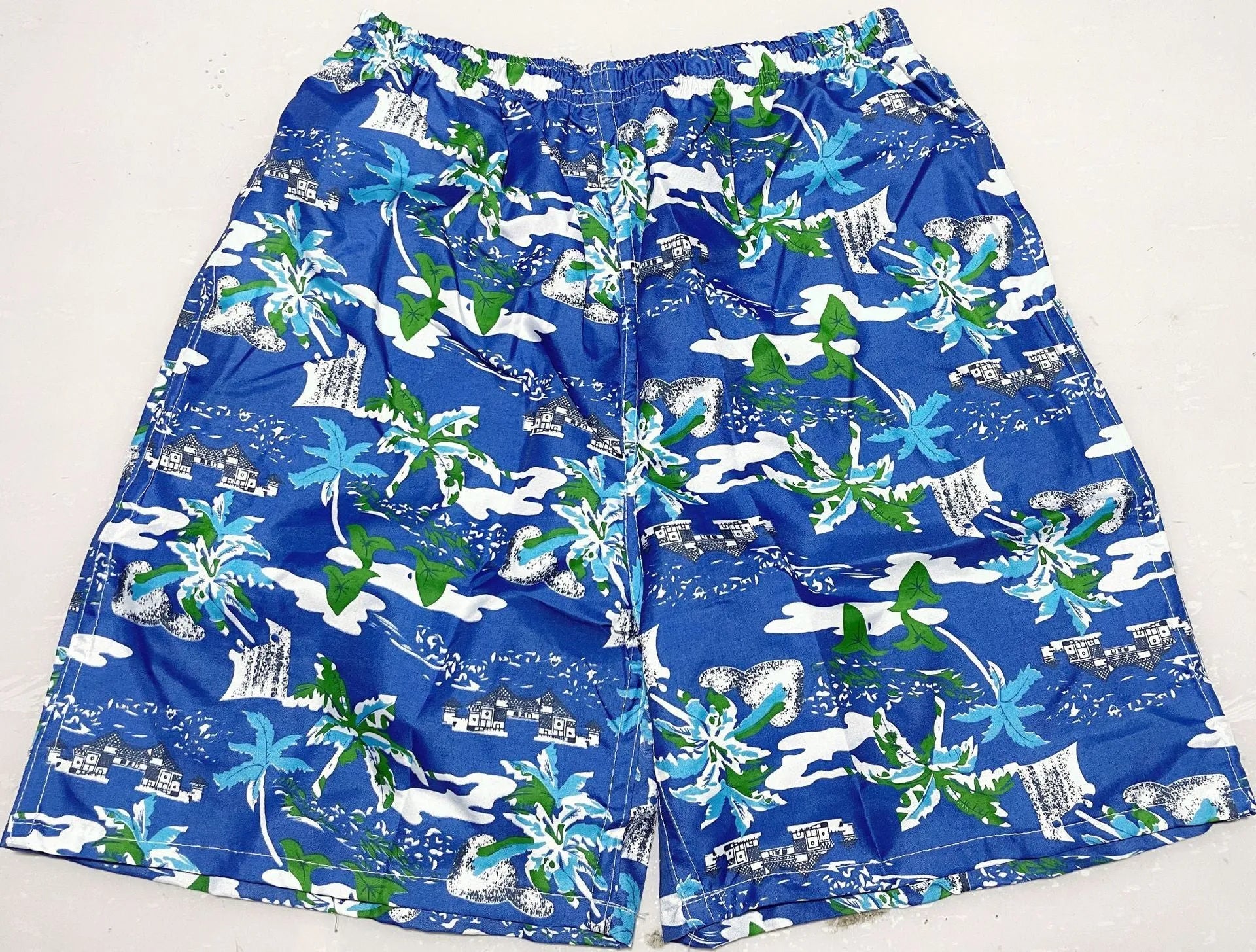 Men's floral print swimming trunks in multiple colour patterns with five-point design