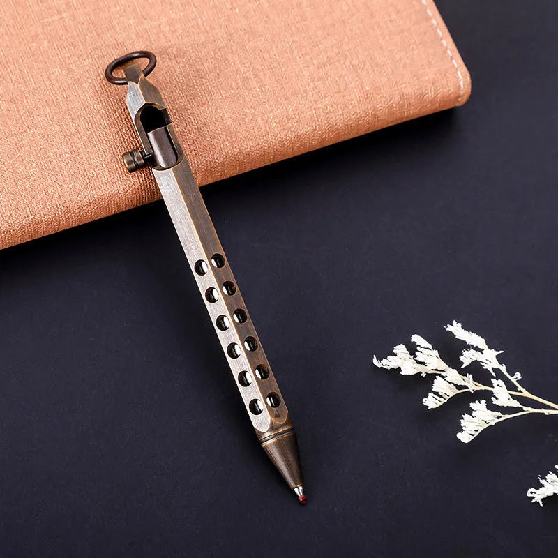 Brass hexagonal bolt pen showing six-sided shape and metallic construction with 0.5mm writing head