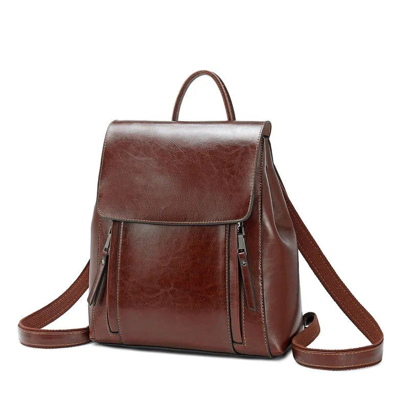 Large genuine leather women's backpack in black with internal organiser pockets and double straps
