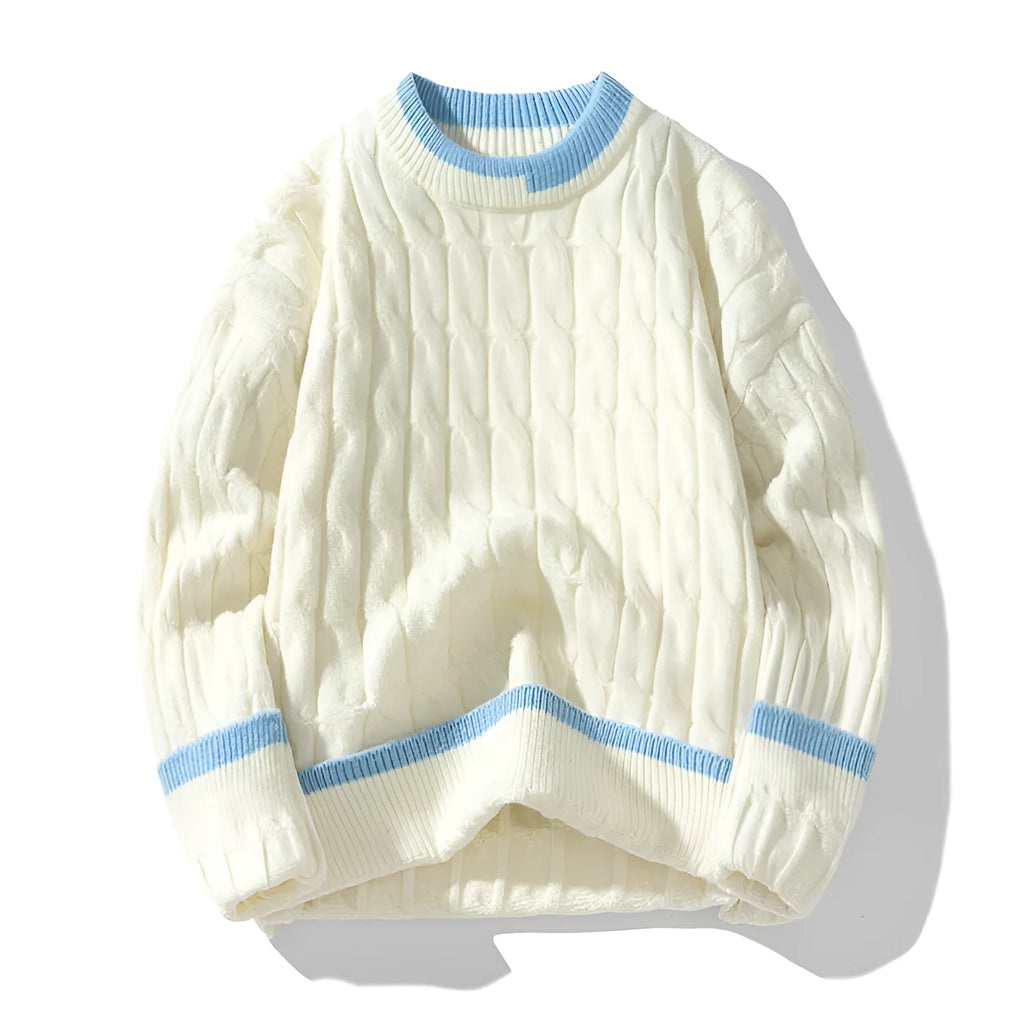 Man wearing a loose-fit long sleeve modal sweater in light blue, part of a two-piece set.