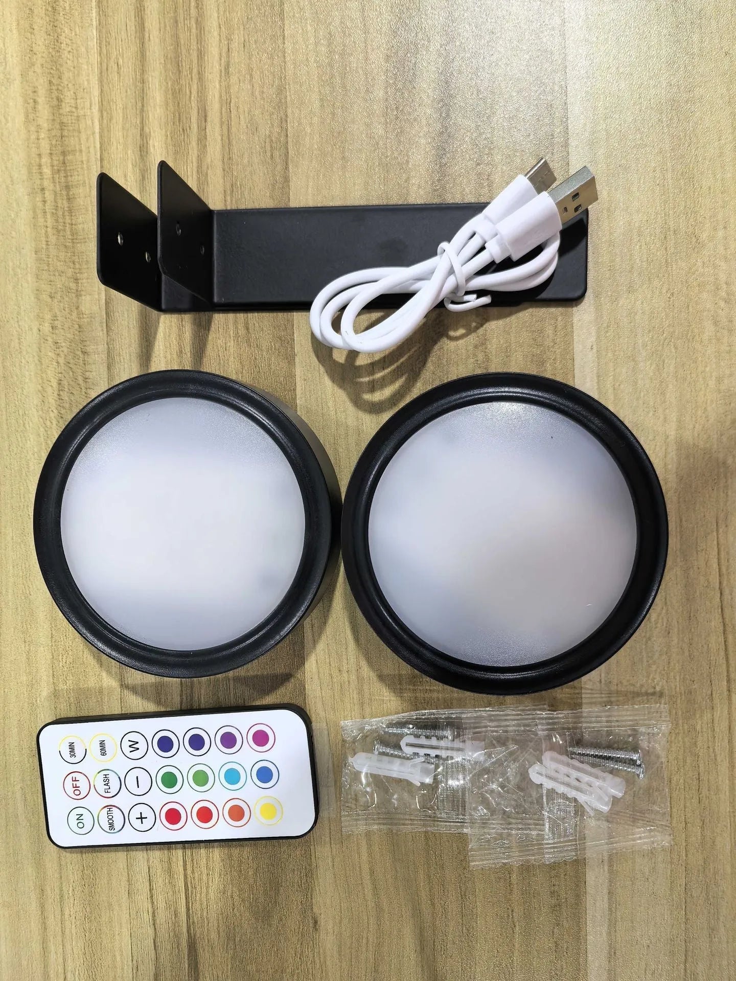 Wireless LED painting lamp with magnetic charging and remote control in black, white or gold finish