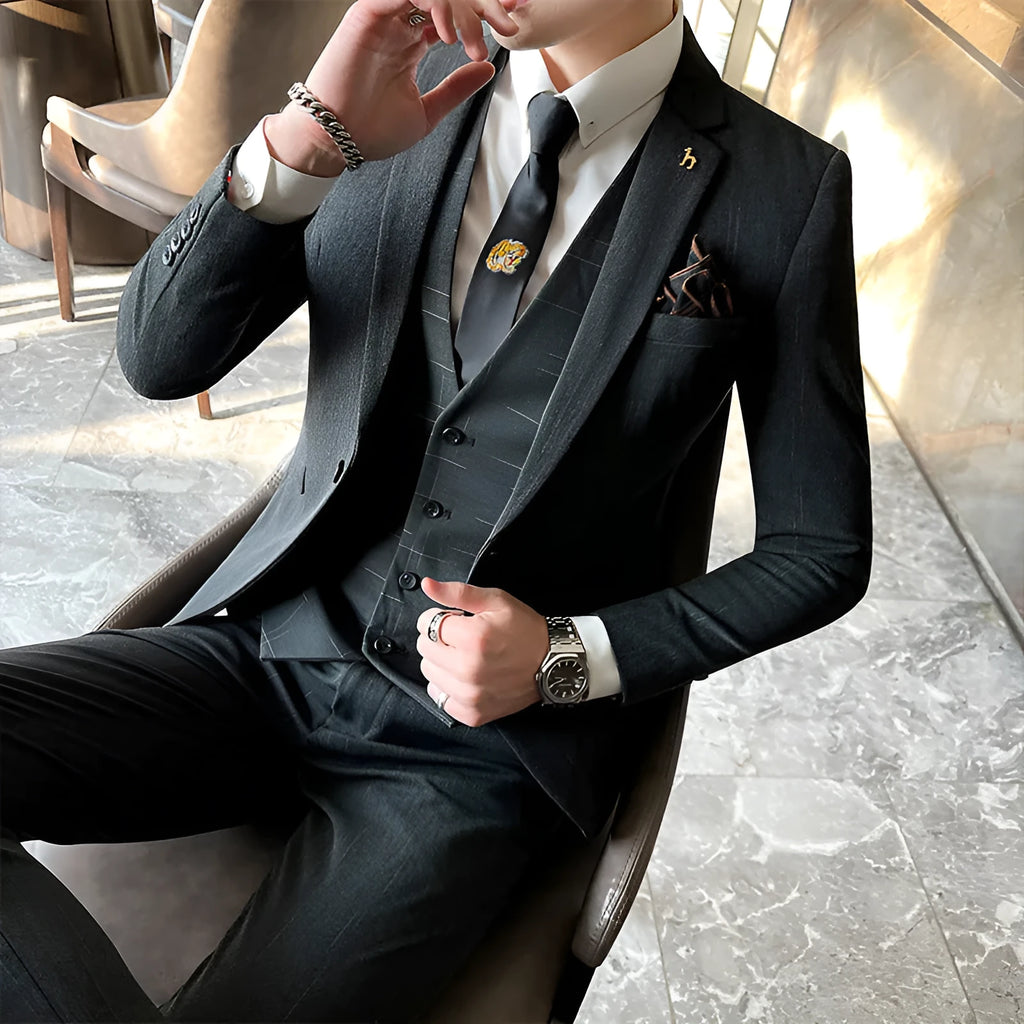 Men's slim fit British style business suit in black or dark grey with adhesive interlining construction