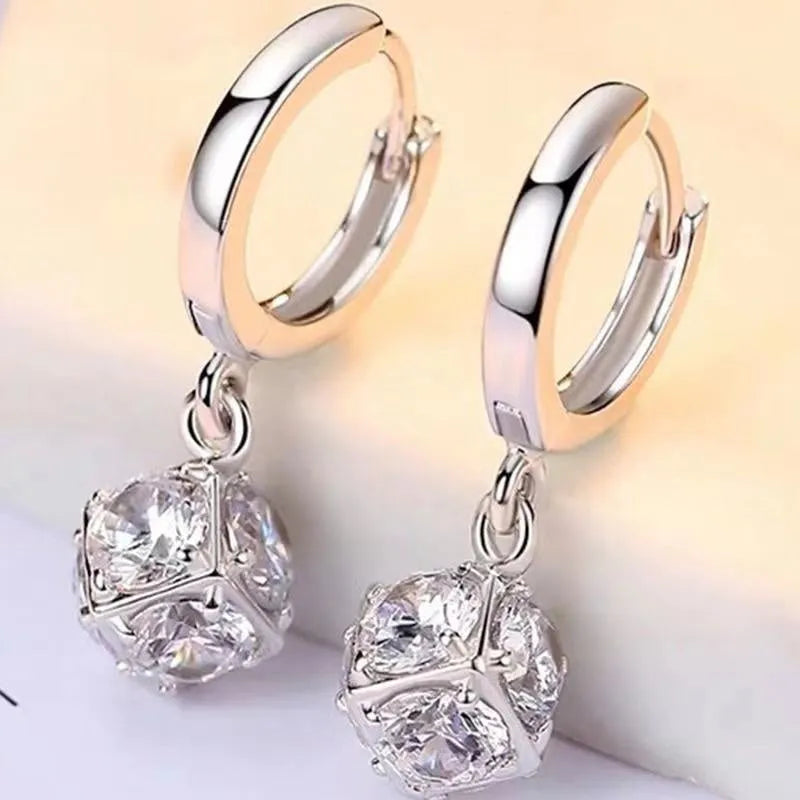 Women's zircon earrings with electroplated finish in geometric rose designs on copper