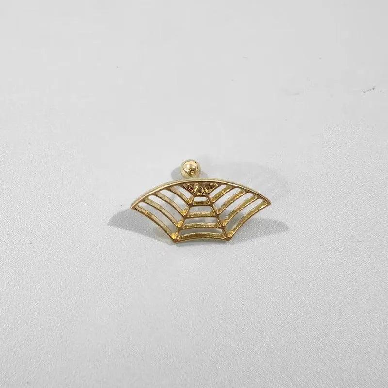 A pair of geometric spider web design stud earrings in an electroplated gold finish.
