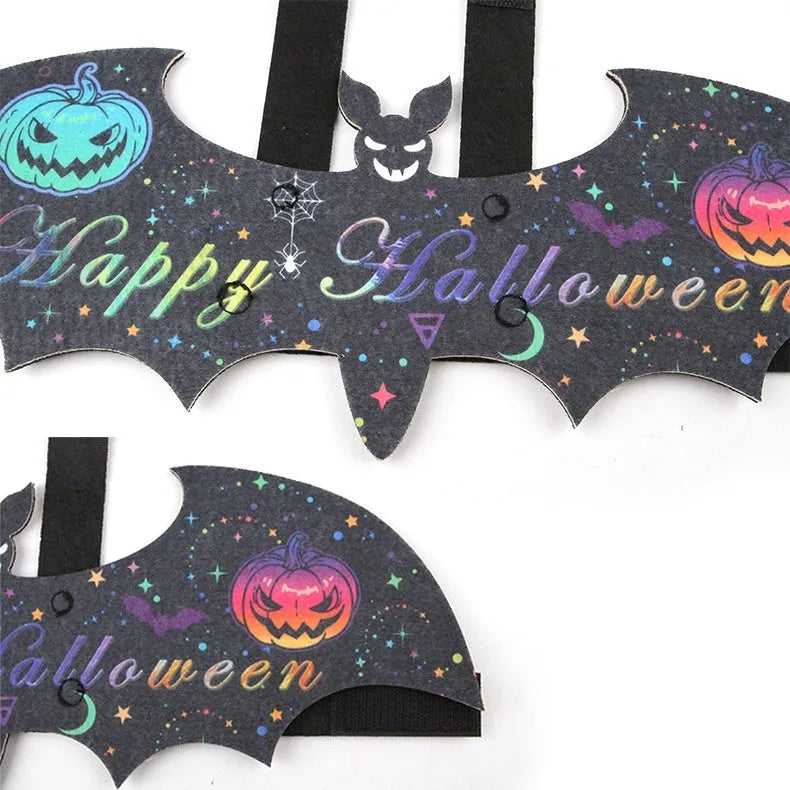 Halloween batwing costume for a cat on a mannequin, shown in orange pumpkin bat colour variant.
