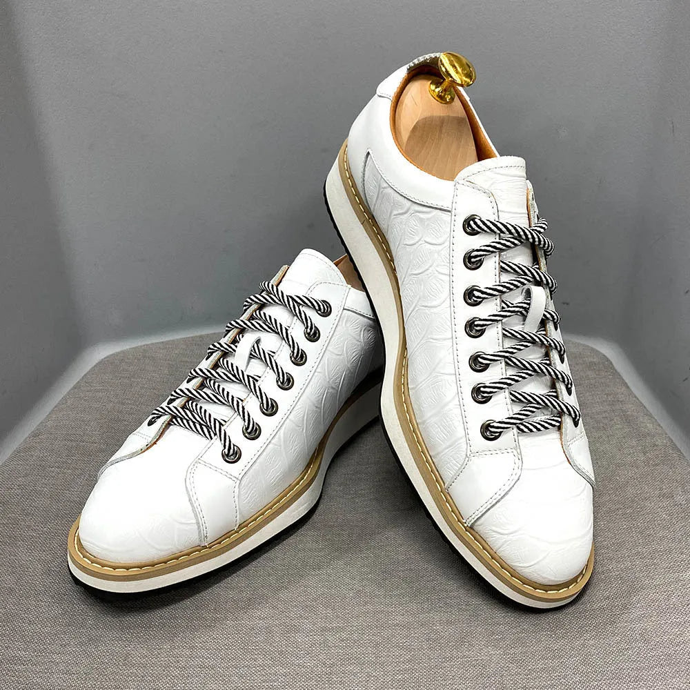 Men's handmade casual shoes with embossed pattern detailing and low tube front tie design