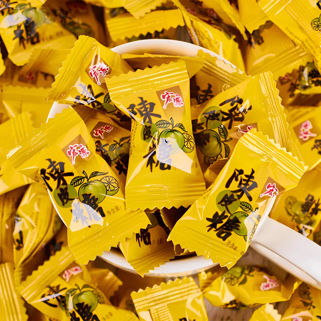 Assorted fruit flavoured hard candy bulk pack showing plum, guava, and tangerine peel varieties