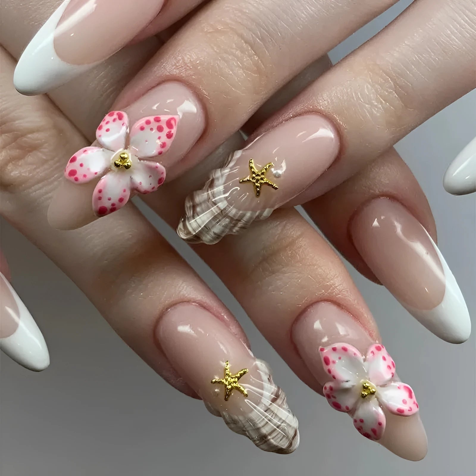 French style fake nails with floral rock pattern design in simple flower colour