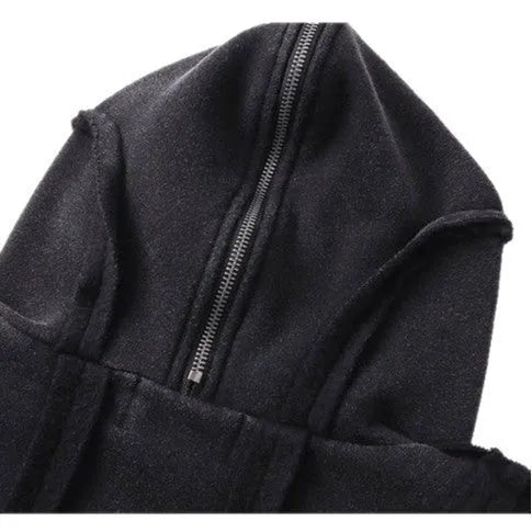 Black men's loose fit zip hooded coat with a retro abstract pattern, worn as a casual autumn jacket.