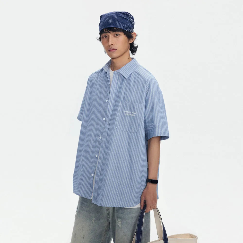 Blue striped short-sleeved overalls shirt with a loose cardigan fit