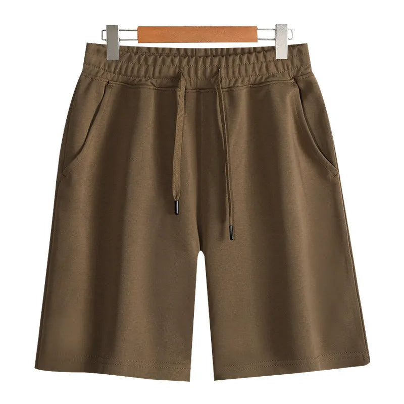 Men's straight-leg cotton summer shorts in light grey, showing fifth length and casual fit.