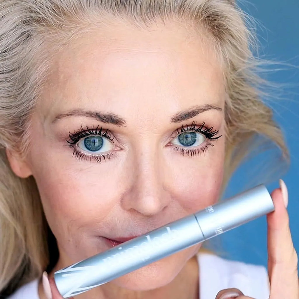 Black eyebrow mascara and eyelash tint tube with spoolie brush applicator, 0.7g content