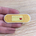 Ten computer embroidered fabric patches with detailed raised designs for clothing decoration