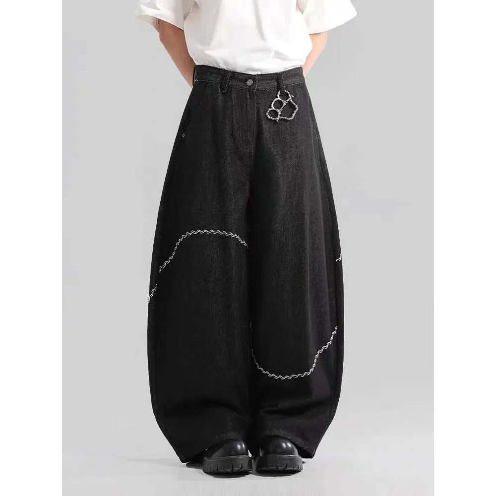 Black straight-leg men's trousers with a mid waist and zip fly, made from micro-elastic denim.