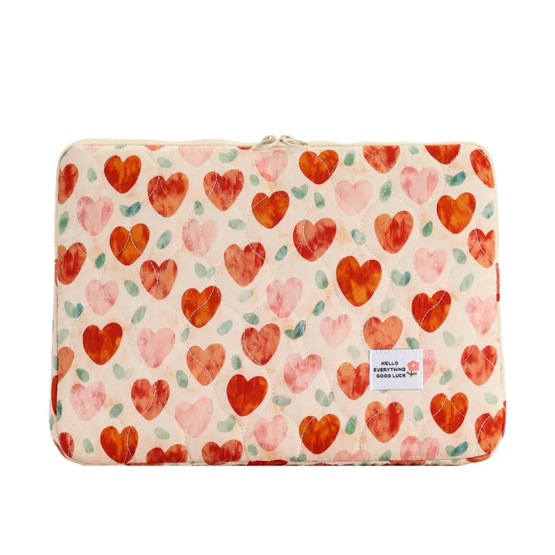 Floral print cloth laptop bag showing green flower pattern with storage compartments and anti-seismic protection