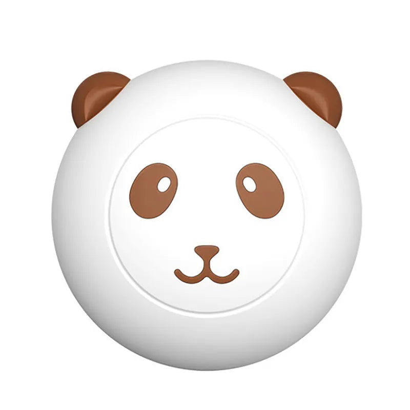Panda-shaped silicone pet bath brush with soft bristles for cleaning cats and dogs.