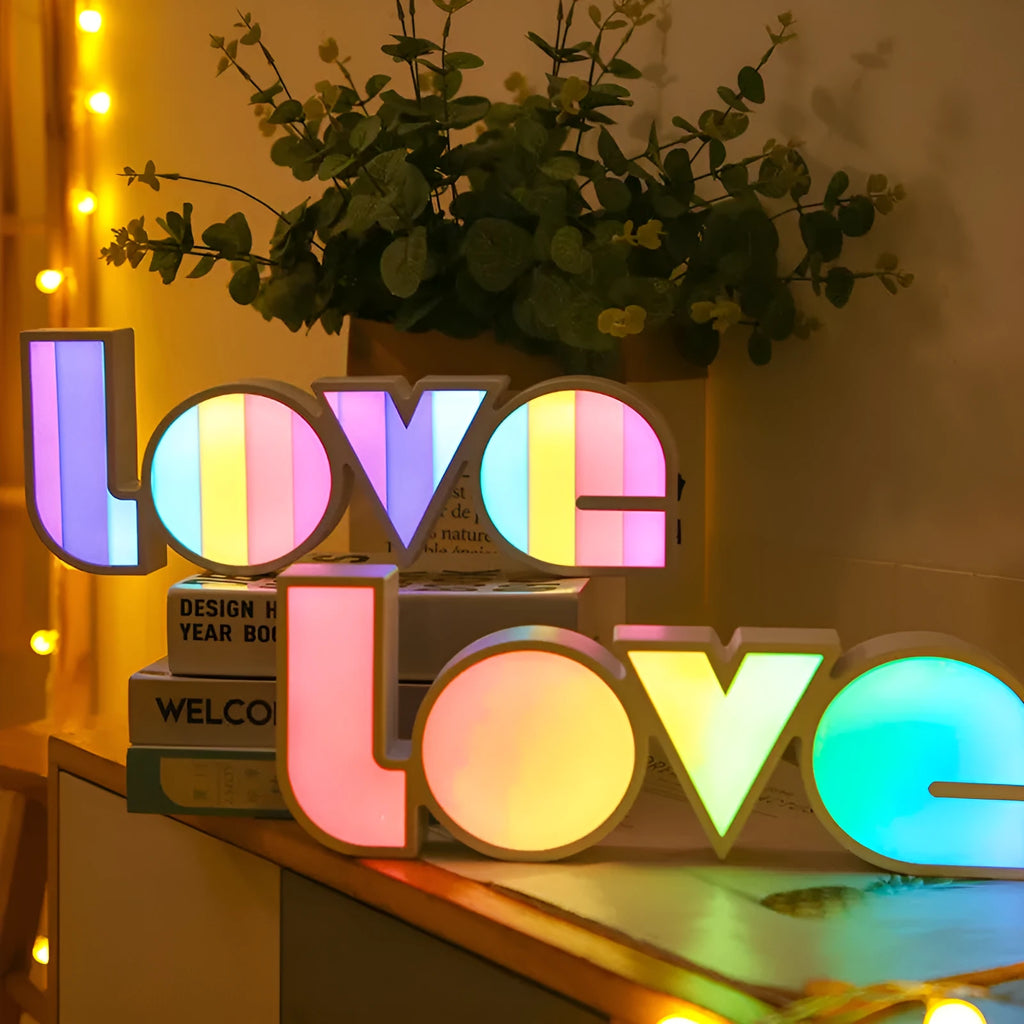 Rainbow style LED LOVE light decoration with plastic shell measuring 35.5cm by 13.5cm