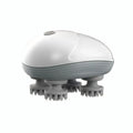Blue handheld electric pet massager with four rotating silicone heads on a white background.
