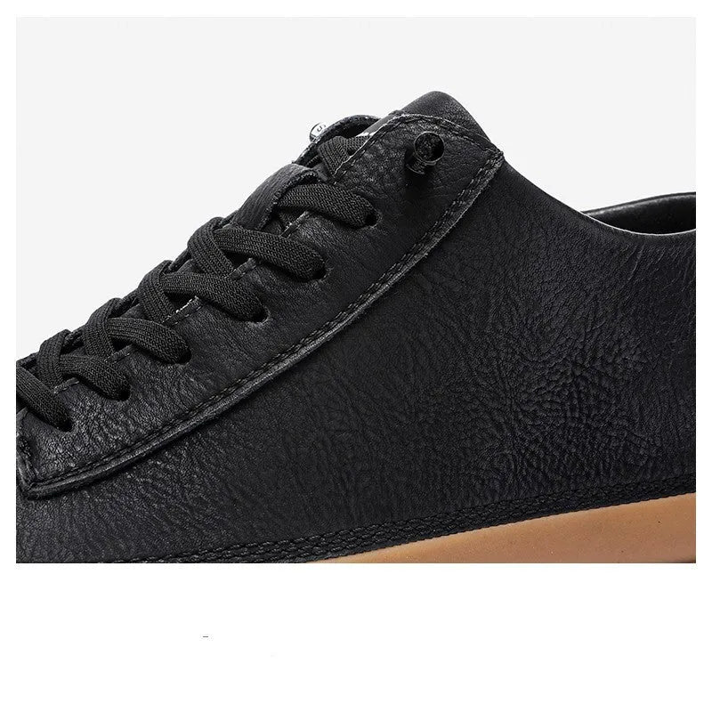 Men's black leather casual shoes with round toe and soft rubber soles shown from side view