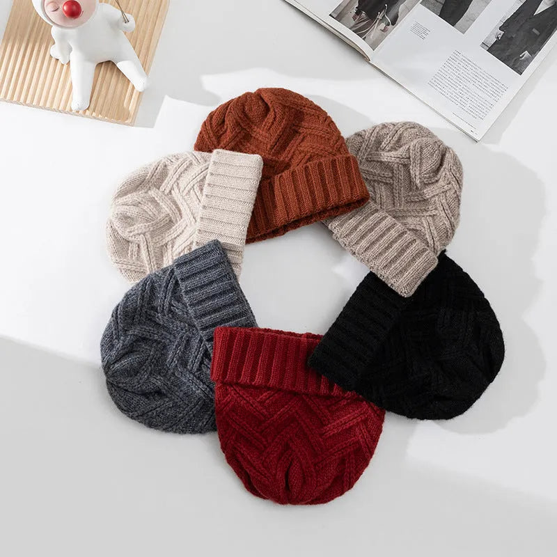 Women's wool knitted dome winter hat with a textured totem pattern.