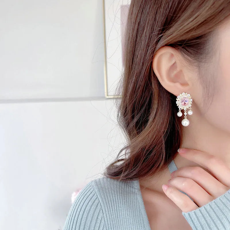 Oval geometric copper earrings with zircon inlays and pearl tassels in light purple colour option