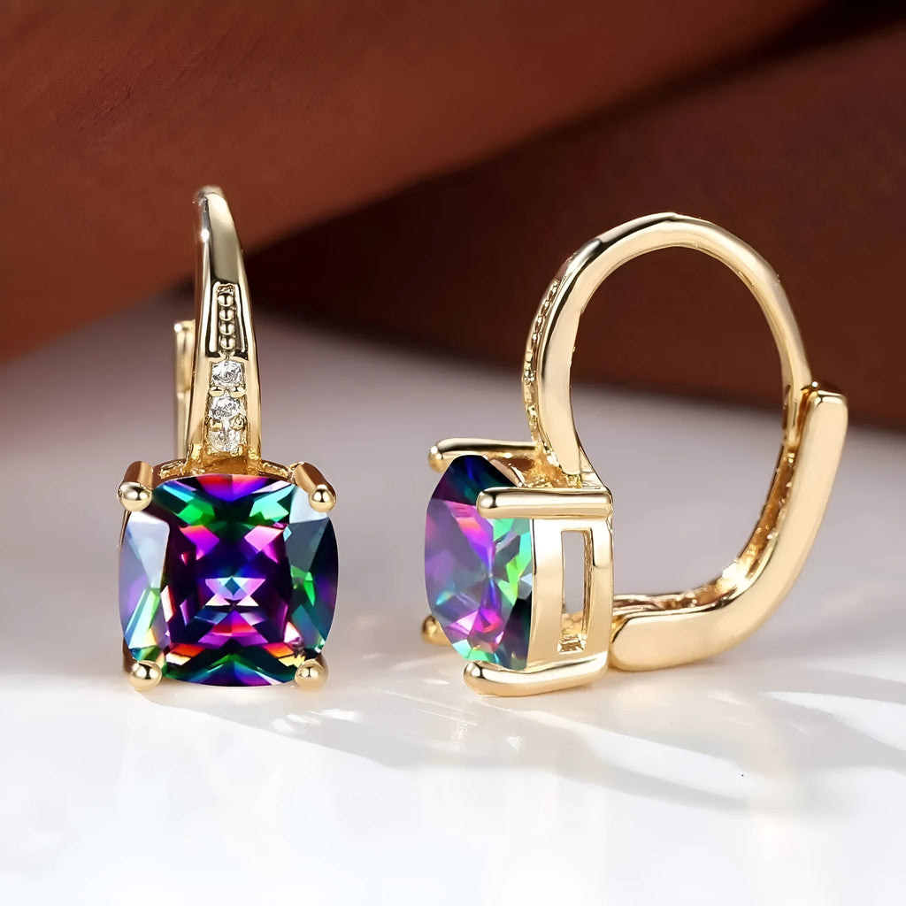 Square geometric ear clips with colourful moissanite stones in gold and silver electroplated finishes.