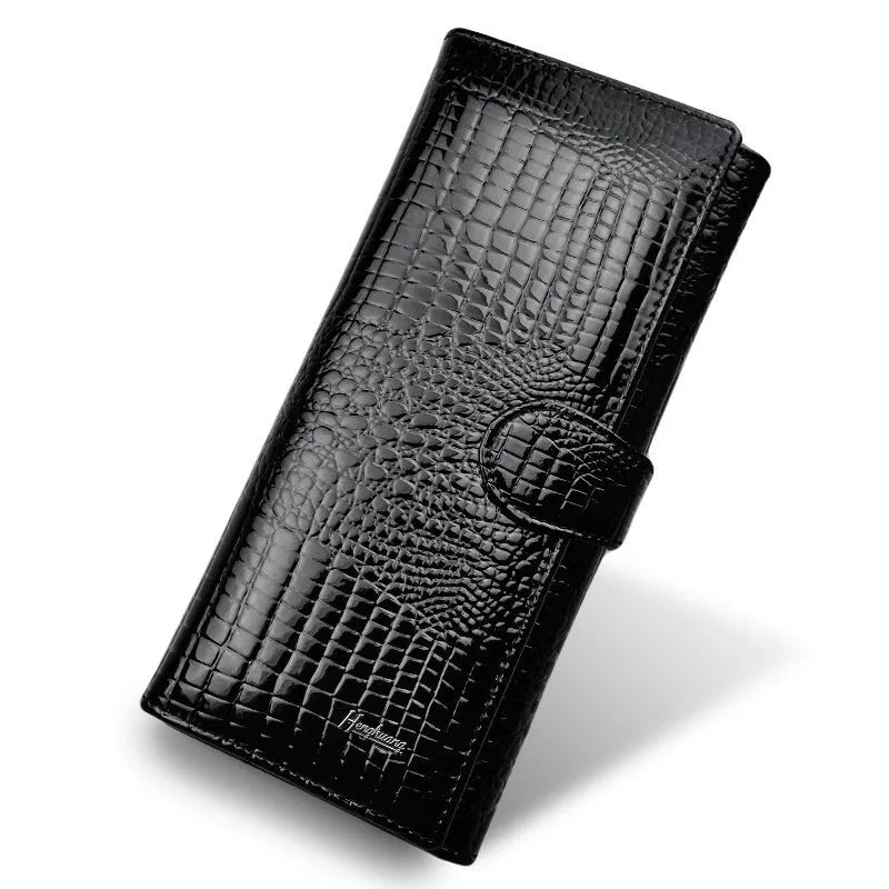 Women's leather coin purse with crocodile pattern texture in red colour showing pigskin lining