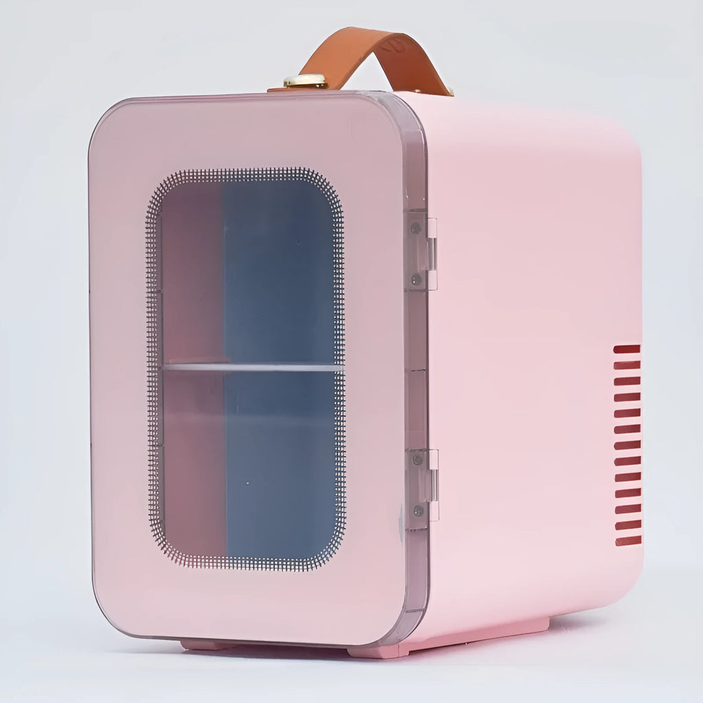 Pink mini refrigerator with transparent door showing internal storage compartments