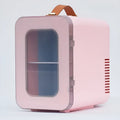 Pink mini refrigerator with transparent door showing internal storage compartments