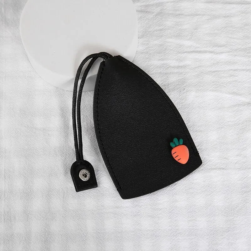 Cartoon pull-out car key case in PU leather with colourful designs measuring 14 x 7.5 cm