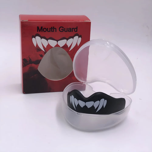 Adult boxing mouthguard with printed teeth design in black and white, for martial arts protection.