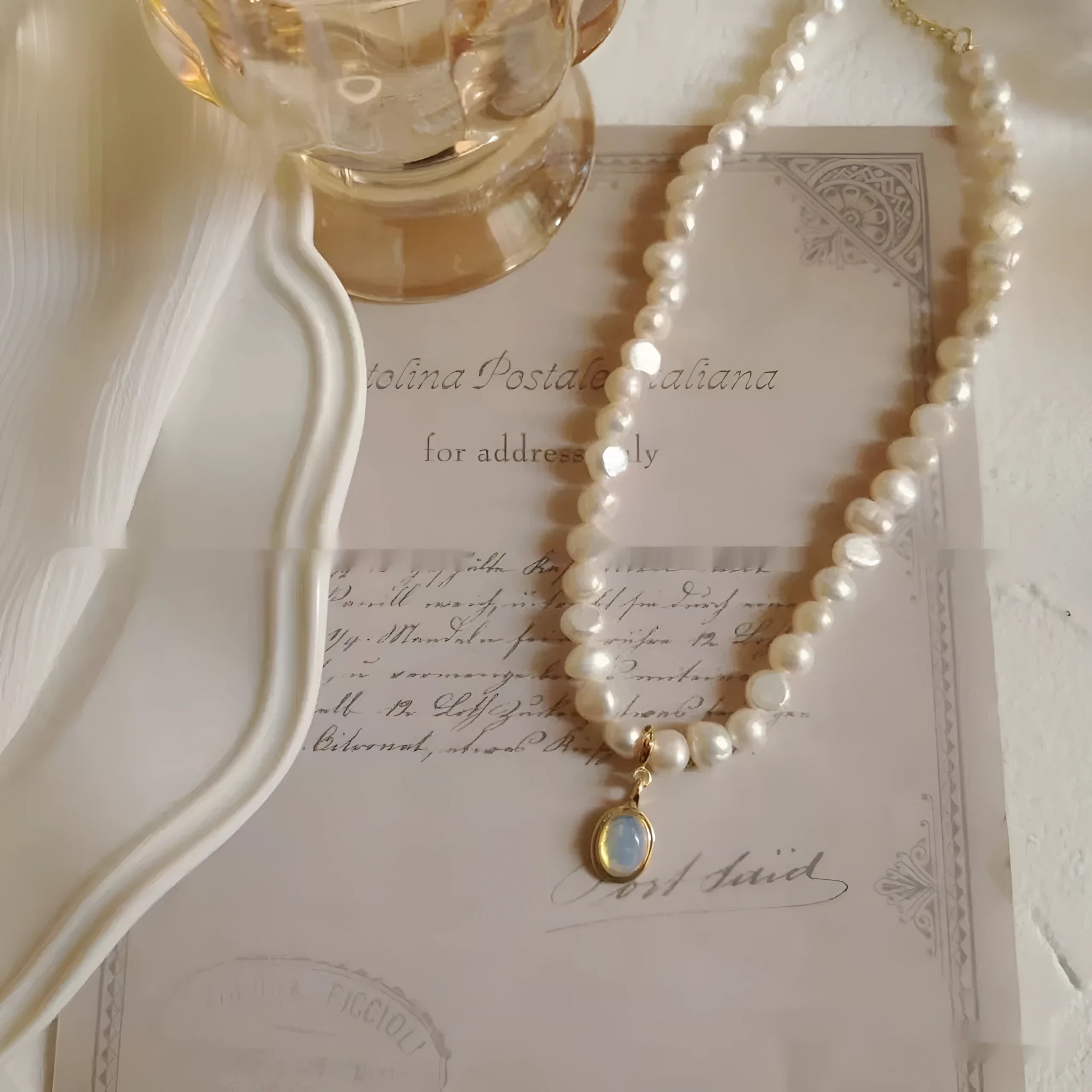 Adjustable French Court vintage style alloy necklace with geometric pendant and pearl details.
