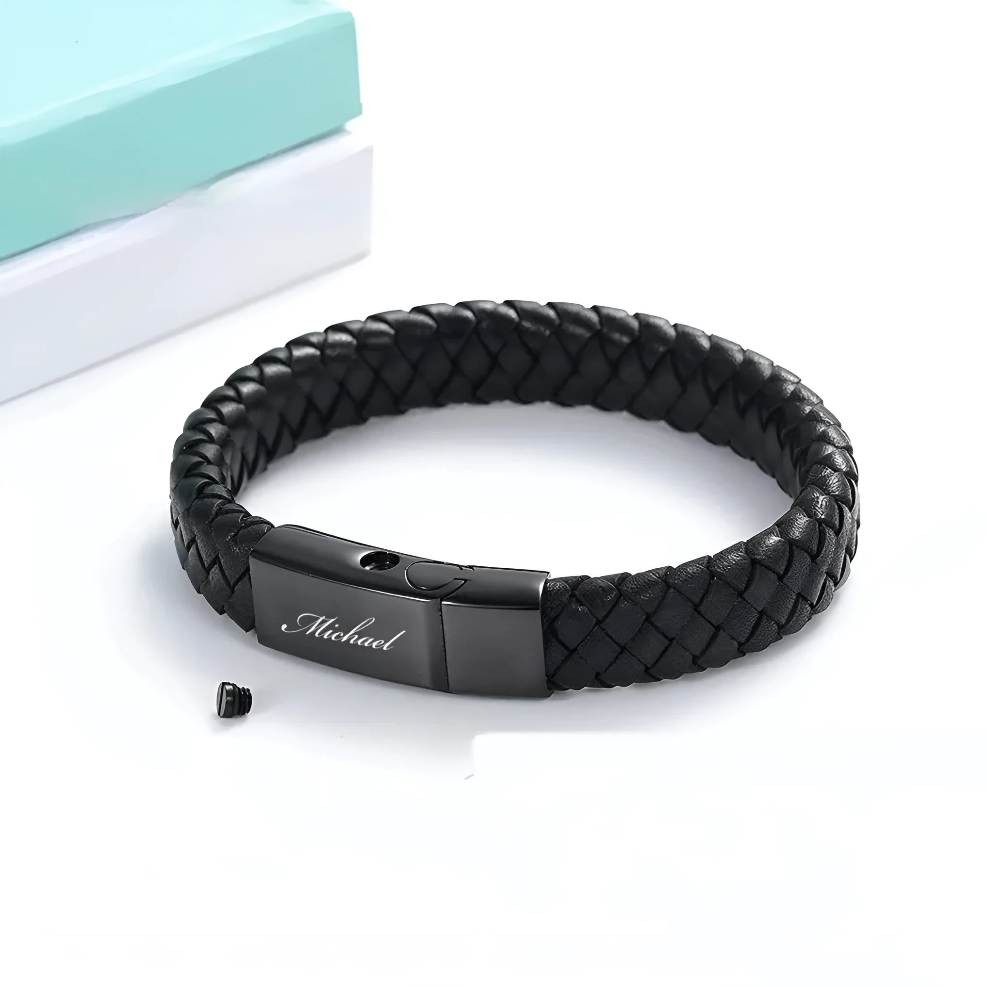 Black woven leather and stainless steel casket bracelet with personalisation for text.