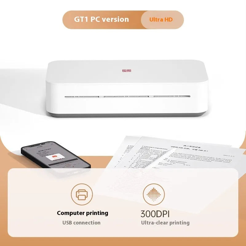 Small white plastic intelligent remote learning printer with a ribbon cartridge on a desk.