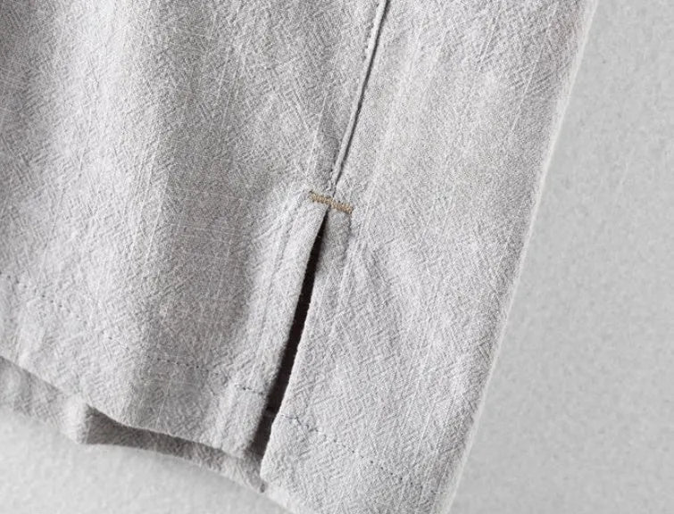 Men's loose fit linen and cotton casual shirt in a solid colour, shown in light grey.