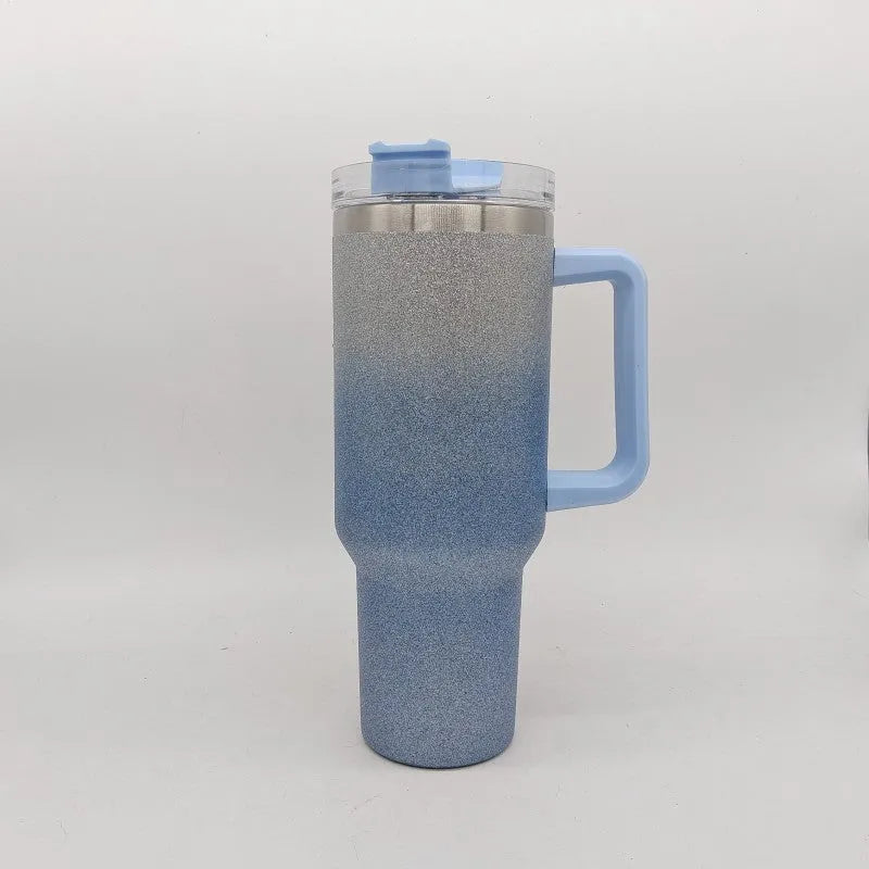 Large stainless steel vacuum insulated cup in a gradient colour option showing its height and simple style.