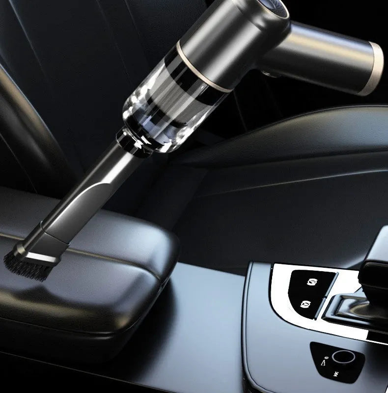 Black wireless handheld car and home vacuum cleaner with multiple nozzle attachments