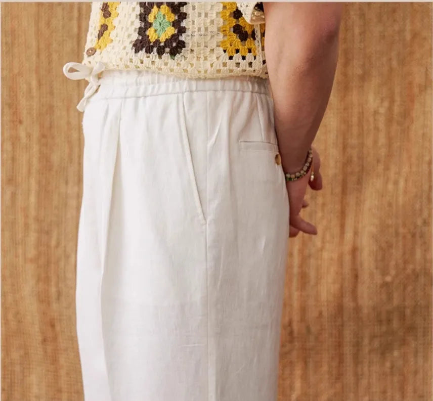 Linen high-waist trousers with elasticated waistband and straight-leg cut in navy blue colour