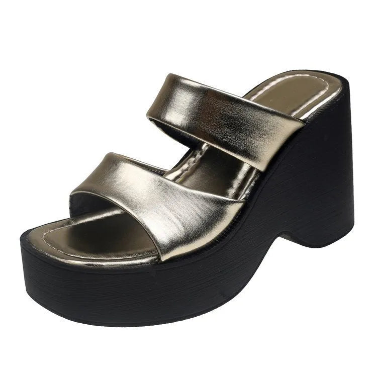 Women's black wedge platform slippers with a square toe on a white background.