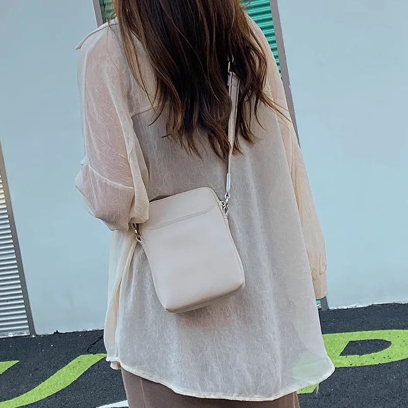 Women's compact crossbody shoulder bag for mobile phones in solid colour with 14.5×5.5×19cm dimensions