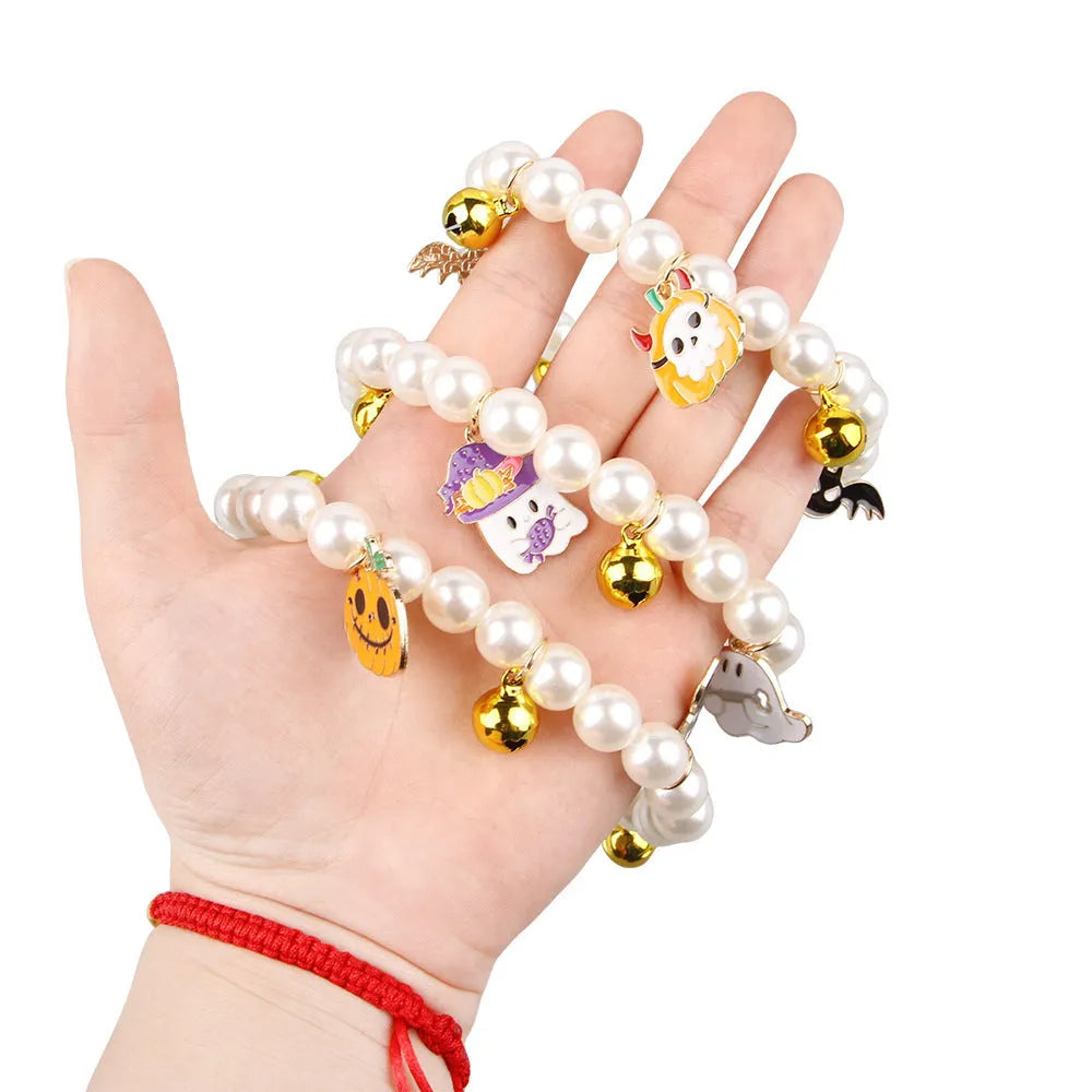 Halloween cat collar with simulated pearl necklace and purple ghost pumpkin ornament