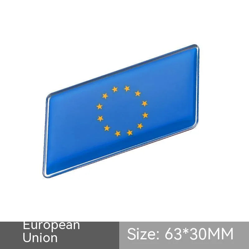 Aluminium parallelogram car sticker with national flag design measuring 6.3 by 3 cm