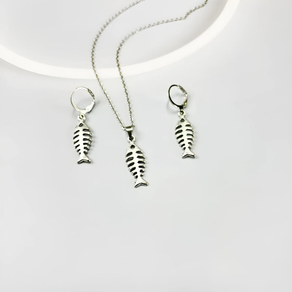Women's fishbone pendant alloy necklace and matching earrings set on a white background