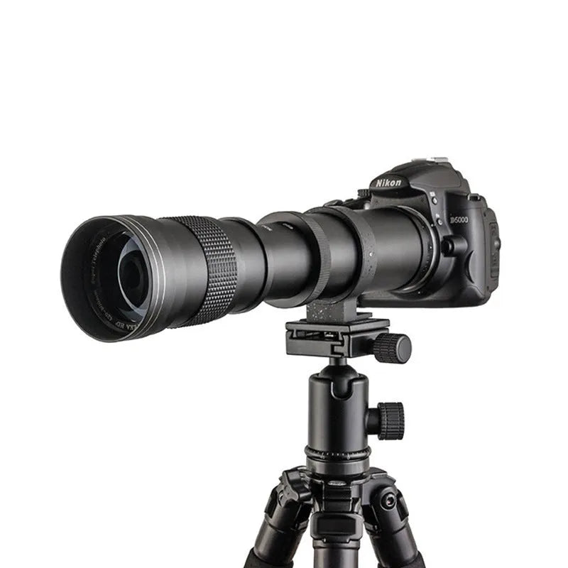 Silver and black manual zoom lens adapter showing extended barrel with 420-800mm markings and 67mm filter thread.