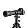 Silver and black manual zoom lens adapter showing extended barrel with 420-800mm markings and 67mm filter thread.